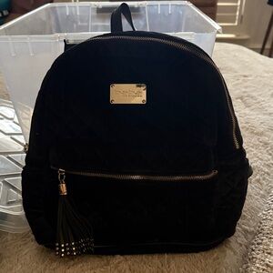 Bebe Black Quilted Backpack with Tassel